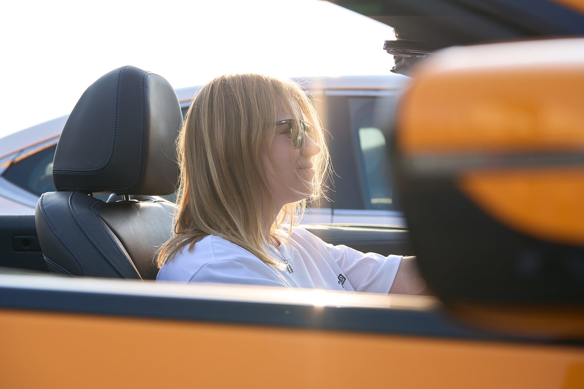 Dubai in three scenes, one orange BMW